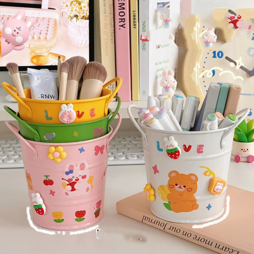 A round metal pen holder in a choice of colours for desktop stationery storage.