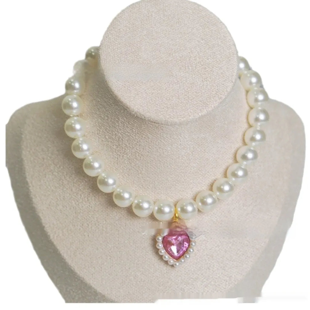 Decorative cat collar with plastic alloy resin construction and central gemstone charm in multiple colour options
