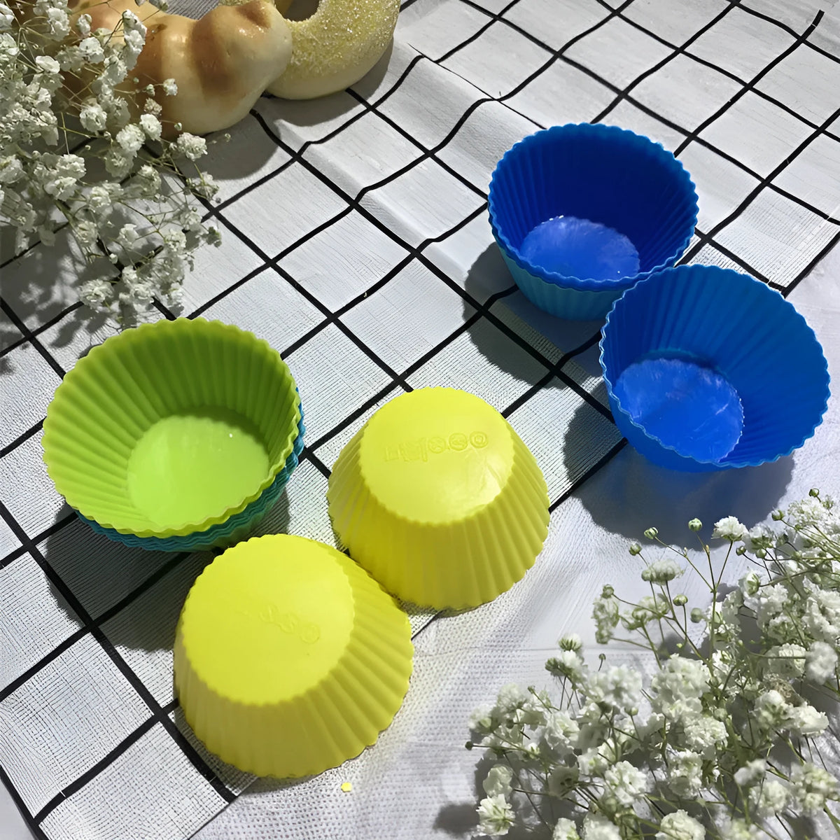 12 reusable silicone cupcake liners in 6 colours, with two nonstick baking cups of each colour.