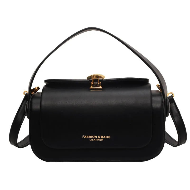 Personalised women's shoulder messenger bag in PU leather, showing letter customisation and stitching detail.