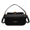 Personalised women's shoulder messenger bag in PU leather, showing letter customisation and stitching detail.