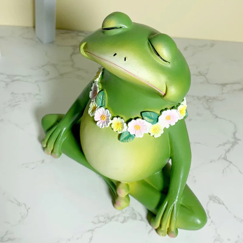Magic Yoga Frog ornament in RDW123 colour on a desk.