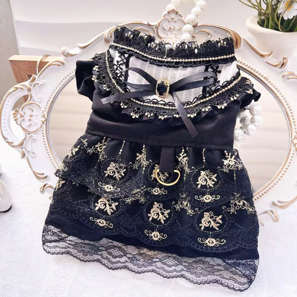 Golden gothic-style flared skirt for a small dog or cat on a white background.