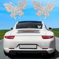Glass car sticker patch with diamond crystals in bear claw or butterfly design, 7cm by 6cm.