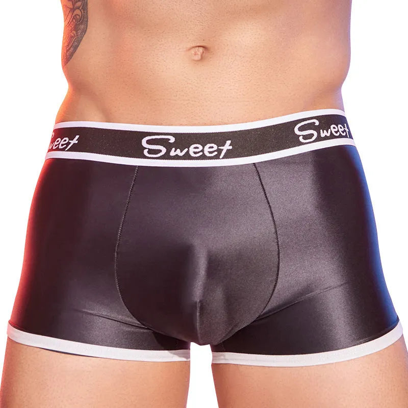 Men's shiny silky nylon boxer shorts in black, white, and sapphire blue colours, free size.