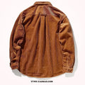 A loose-fitting caramel corduroy shirt with long sleeves in a casual cardigan style.
