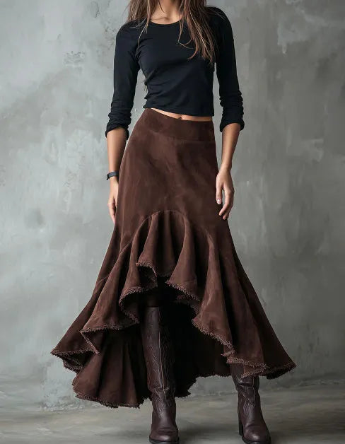 Brown women's high-low maxi skirt with a ruffle hem and textured eco suede finish.