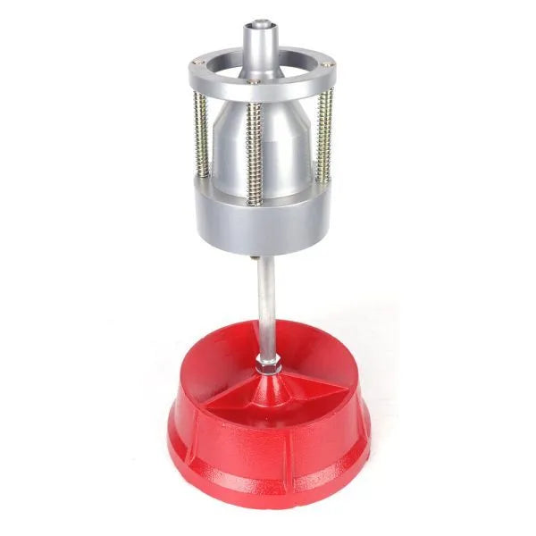 Portable wheel balancer tool with aluminium head and bull's-eye level on a black enamel base.