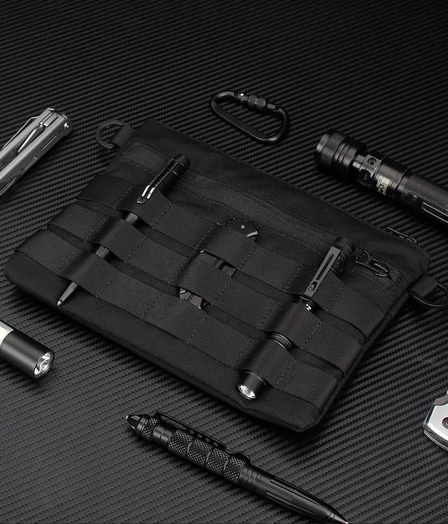 Black Oxford cloth portable outdoor kit measuring 18 by 3.5 centimetres