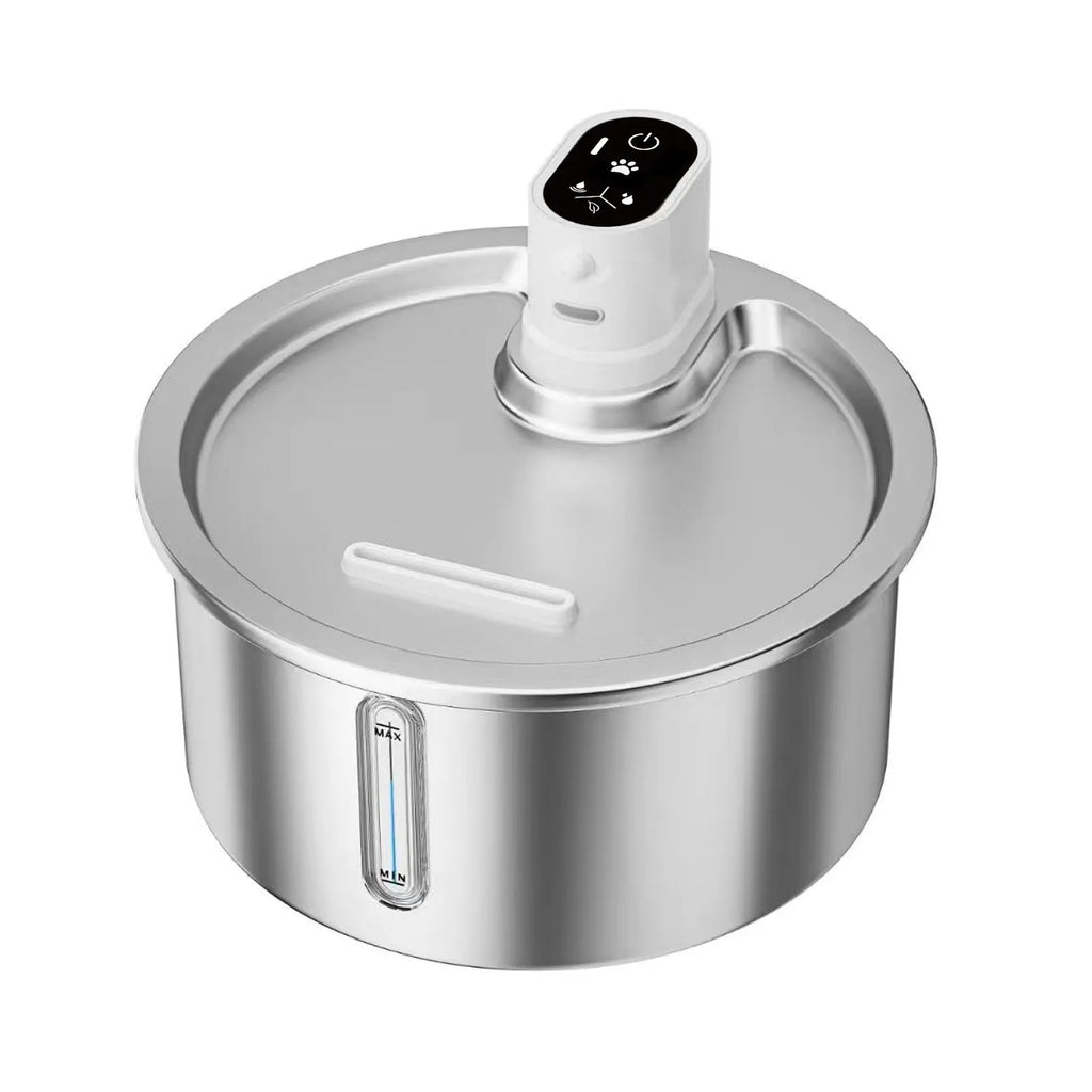 Stainless steel cat water fountain with heating base on a table.