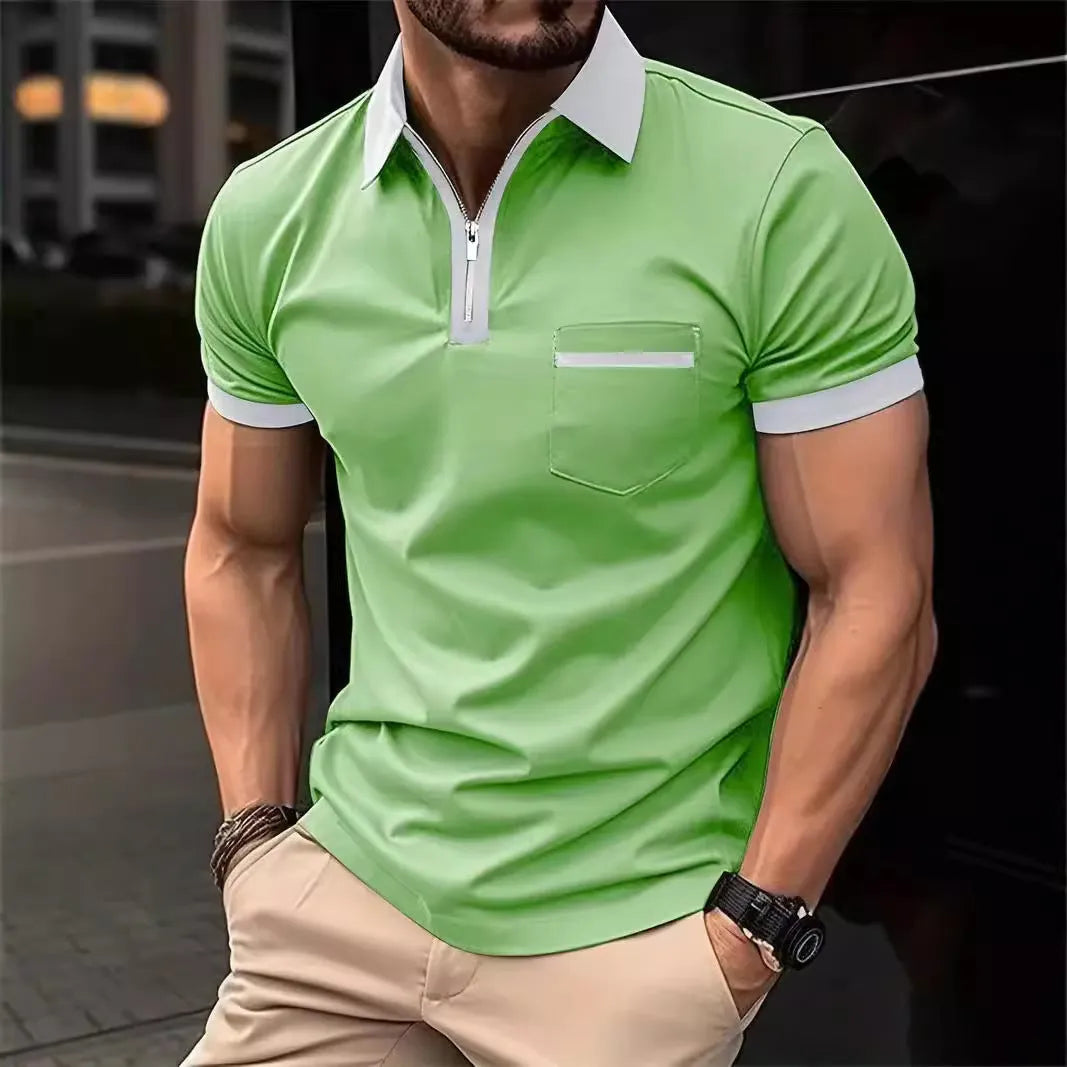 Man wearing a loose fit casual short sleeve shirt with a chest pocket and zipper decoration.
