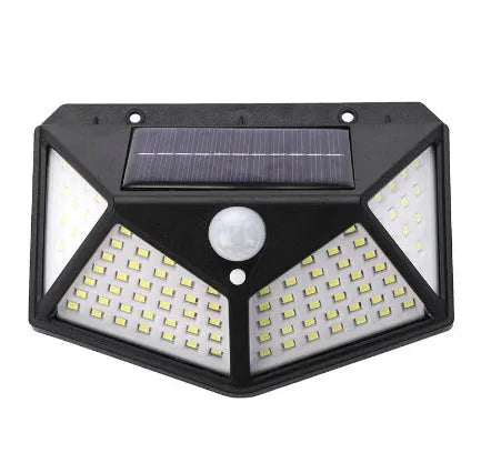 Solar outdoor garden lamp with LED lights and motion sensor in garden setting