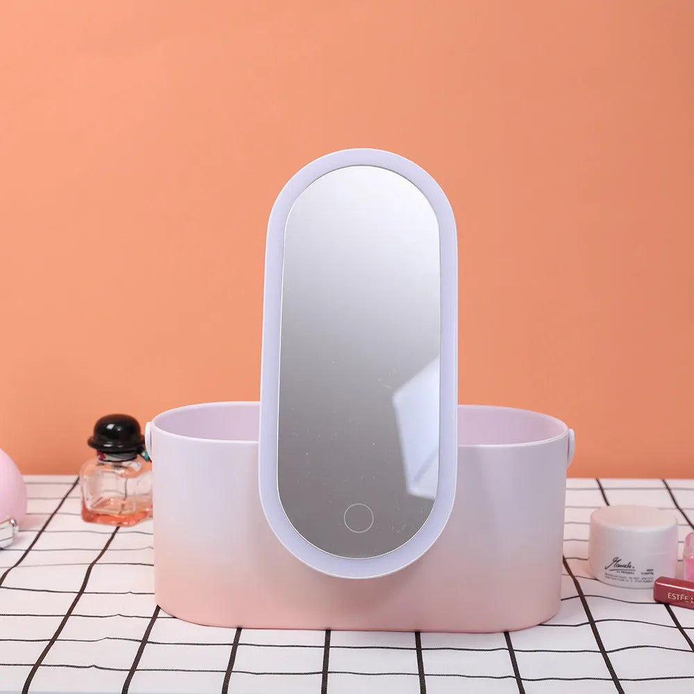 Pink gradient portable LED makeup mirror and organiser storage box with USB charging port.