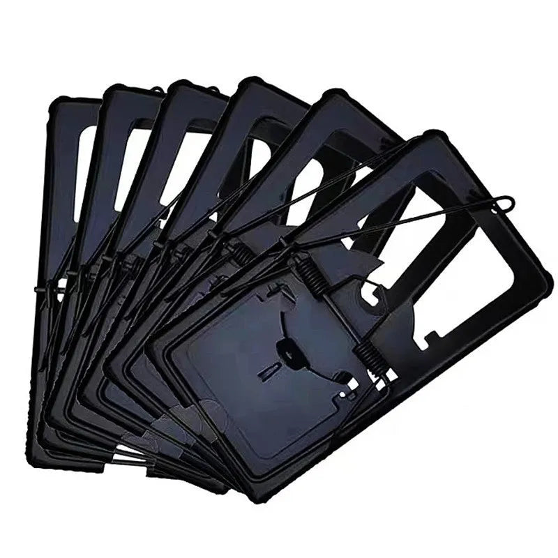 Automatic humane mouse trap cage made of white plastic with a metal door, shown in small, medium, and large sizes.