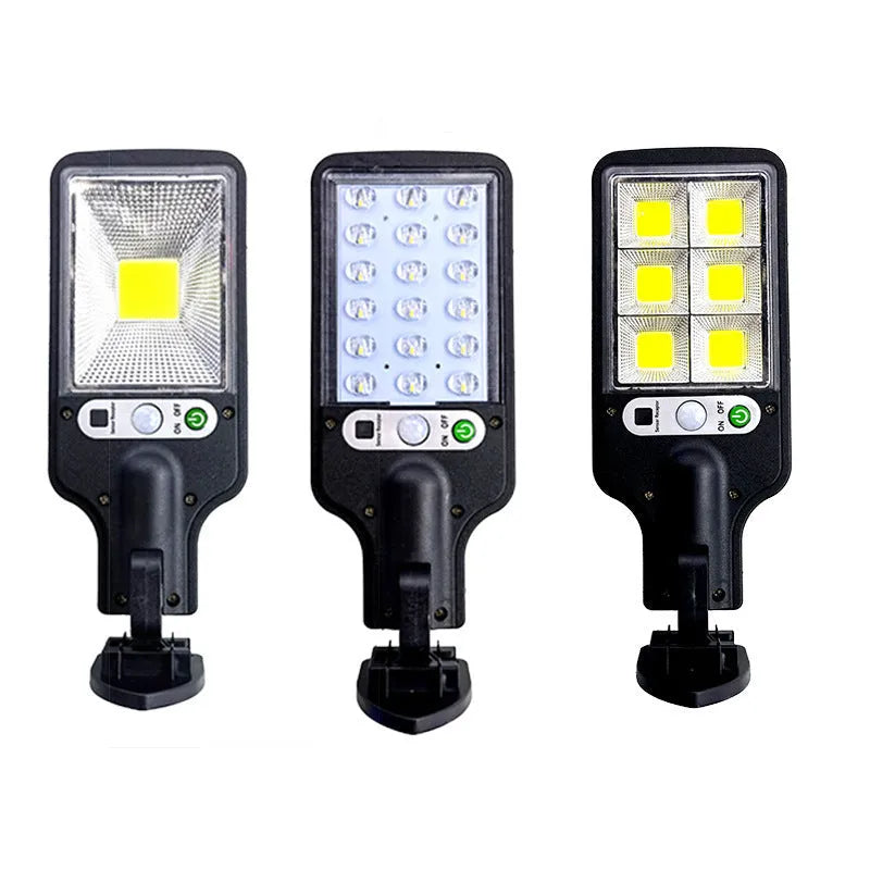 Outdoor solar LED wall lamp with 5.5V 2.5W solar panel, 227x84x40mm, white housing, mounted on a brick wall