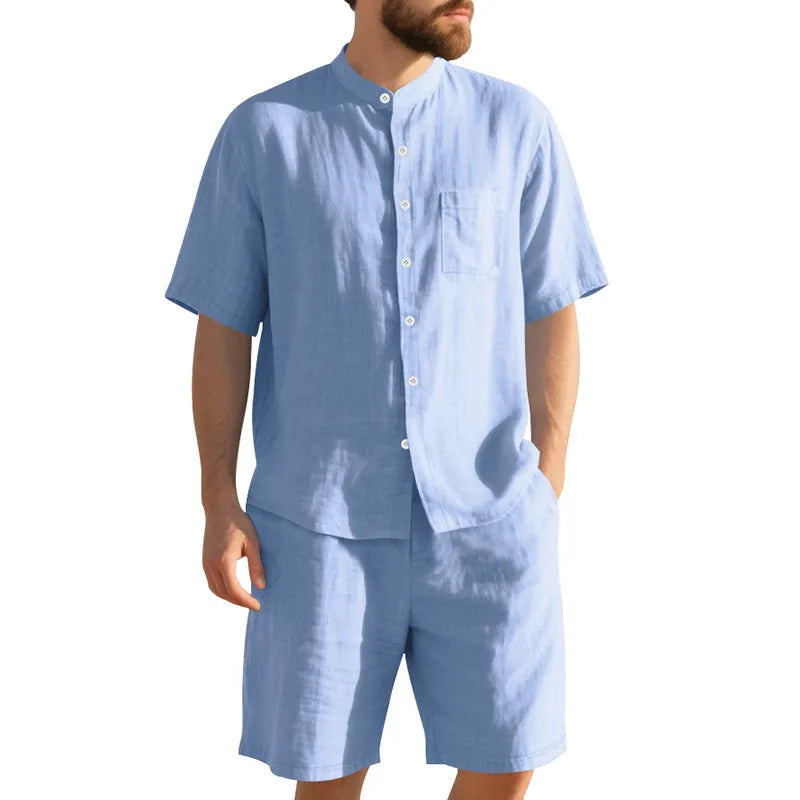Men's light blue linen blend summer suit with short sleeves and shorts on a hanger.