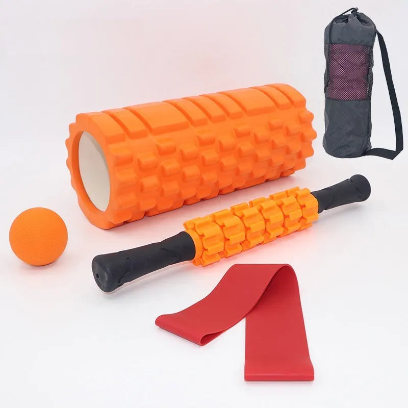 Black 33cm fitness foam roller and massage stick set on a grey background.