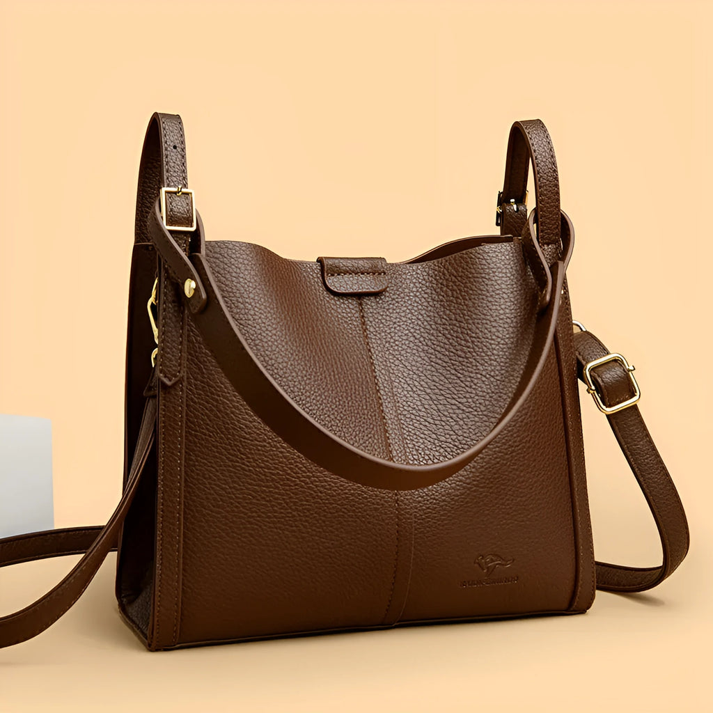 Ladies retro shoulder bag in vertical square shape showing PU material construction and internal compartments