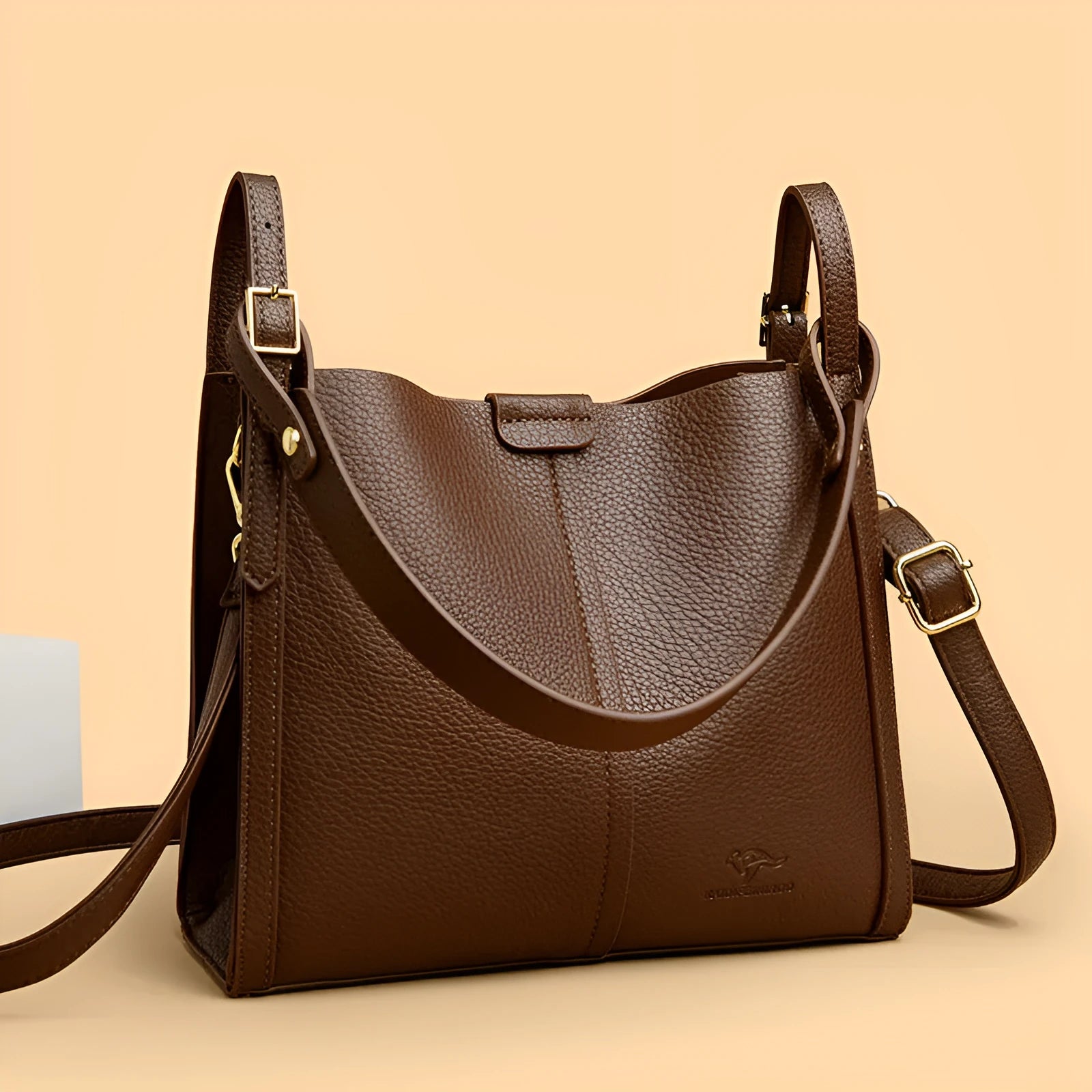 Ladies retro shoulder bag in vertical square shape showing PU material construction and internal compartments