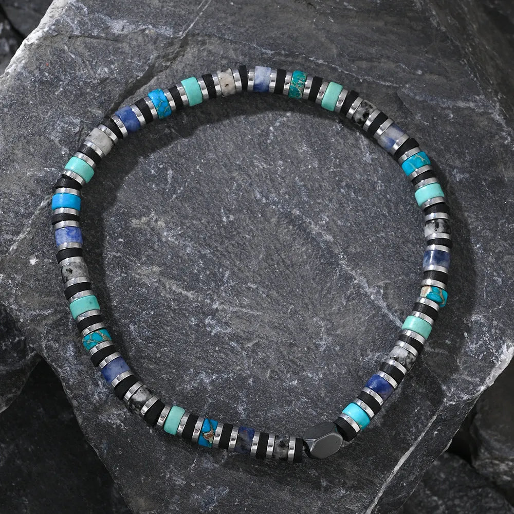 Hand-woven bohemian bracelet with natural semi-precious stones in cylindrical geometry design