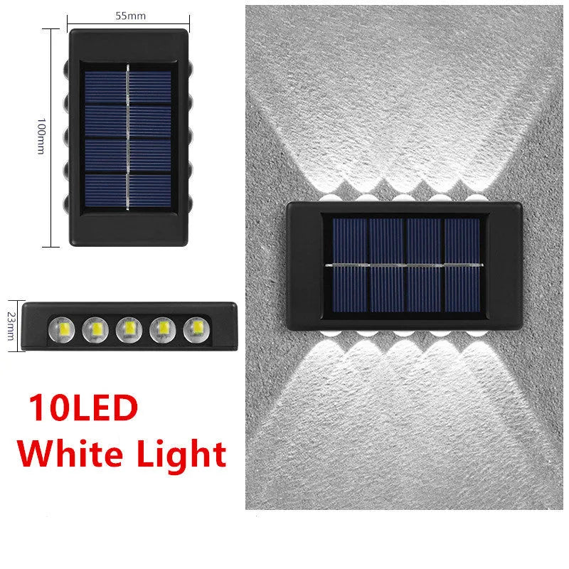 Solar outdoor wall light with up and down glow, black ABS+PC housing, warm white SMD LEDs