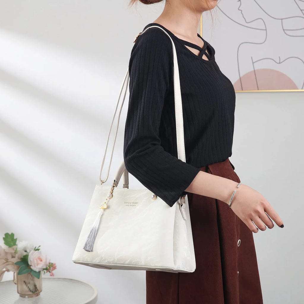 Women's PU shoulder bag in horizontal square shape with slit pocket, available in beige, black, green or red ethnic colours