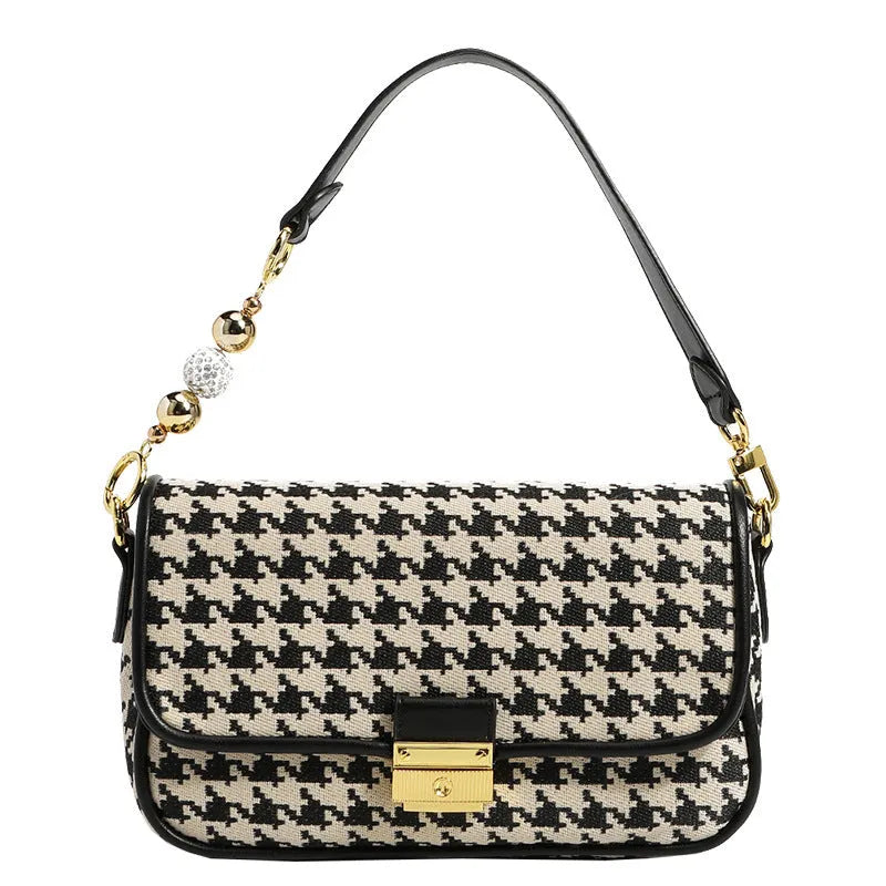 Houndstooth plaid shoulder bag with embossed texture, 23 x 7 x 14 cm, showing slit pocket and picture colour.