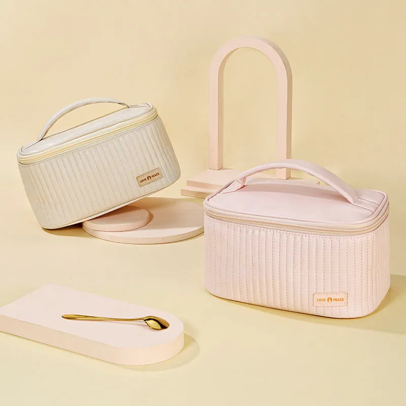 Open-top women's makeup bag in PU leather, shown in a light blue solid colour.