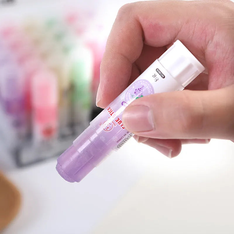 Jelly solid glue in random colour with fruit fragrance, 8.5 cm long by 2 cm wide