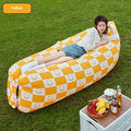 Inflatable lazy sofa in outdoor setting with Oxford cloth surface and colourful design options