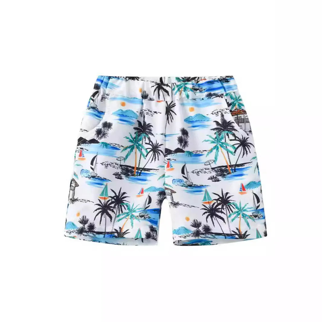 Multi-colour printed beach shorts with elastic waist for children on a summer background