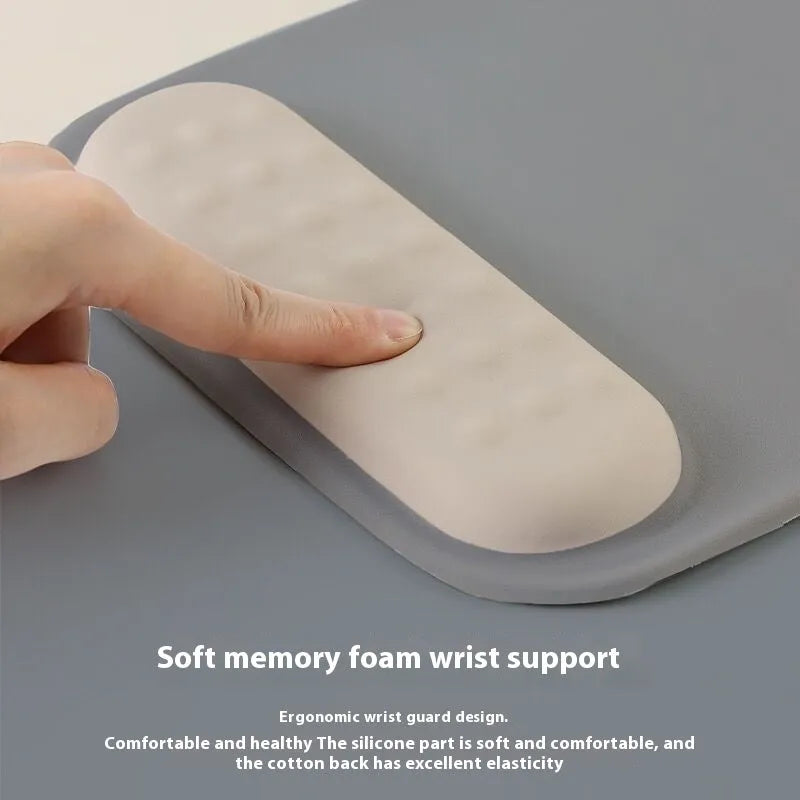Ergonomic cloth silicone mouse pad for wrist support in a contrast colour style.