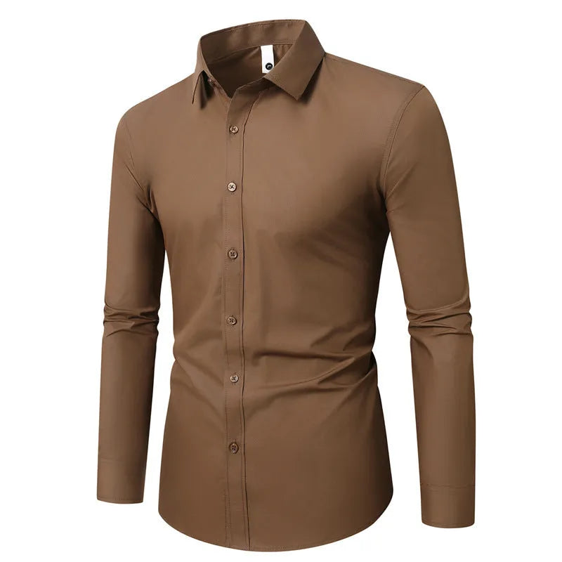 Man wearing a loose fit long sleeve linen shirt in a neutral colour, showing the casual style.