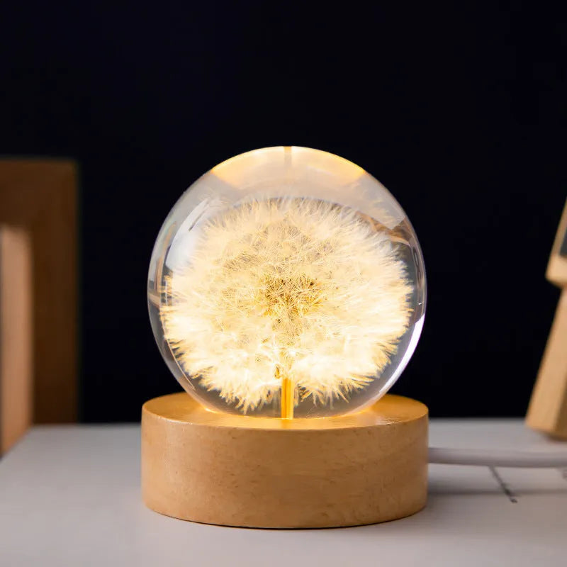 3D dandelion flower inside a 60mm clear crystal ball night light on a beech wood stand