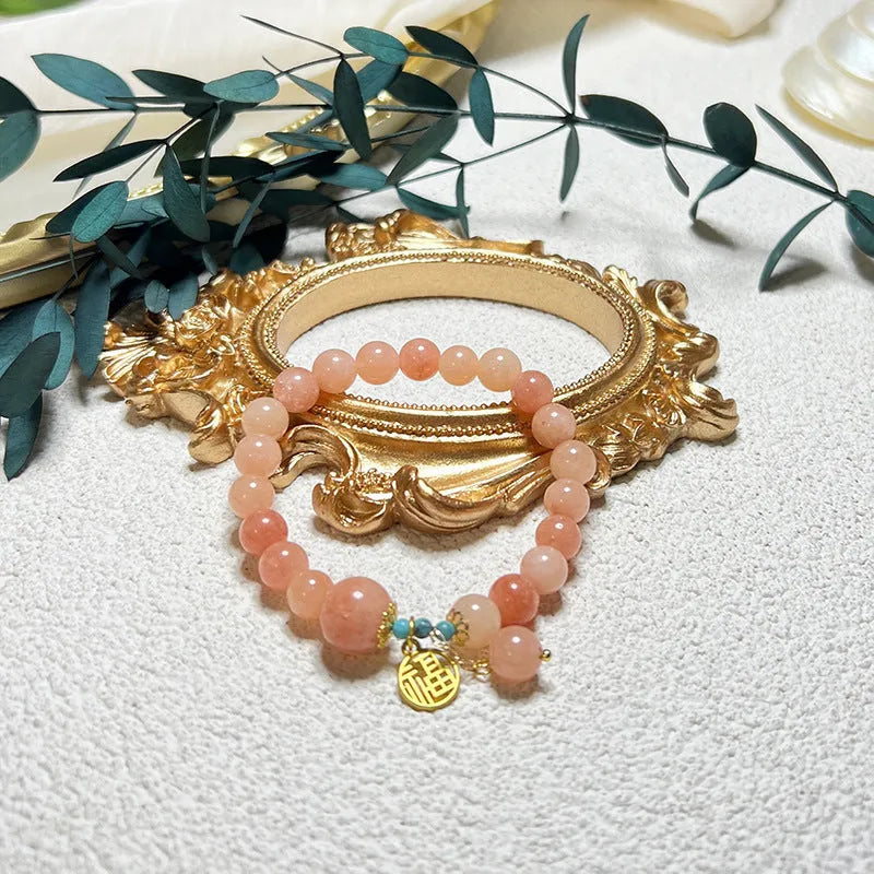 Pink agate natural stone bracelet with adjustable alloy chain and lobster clasp fastening