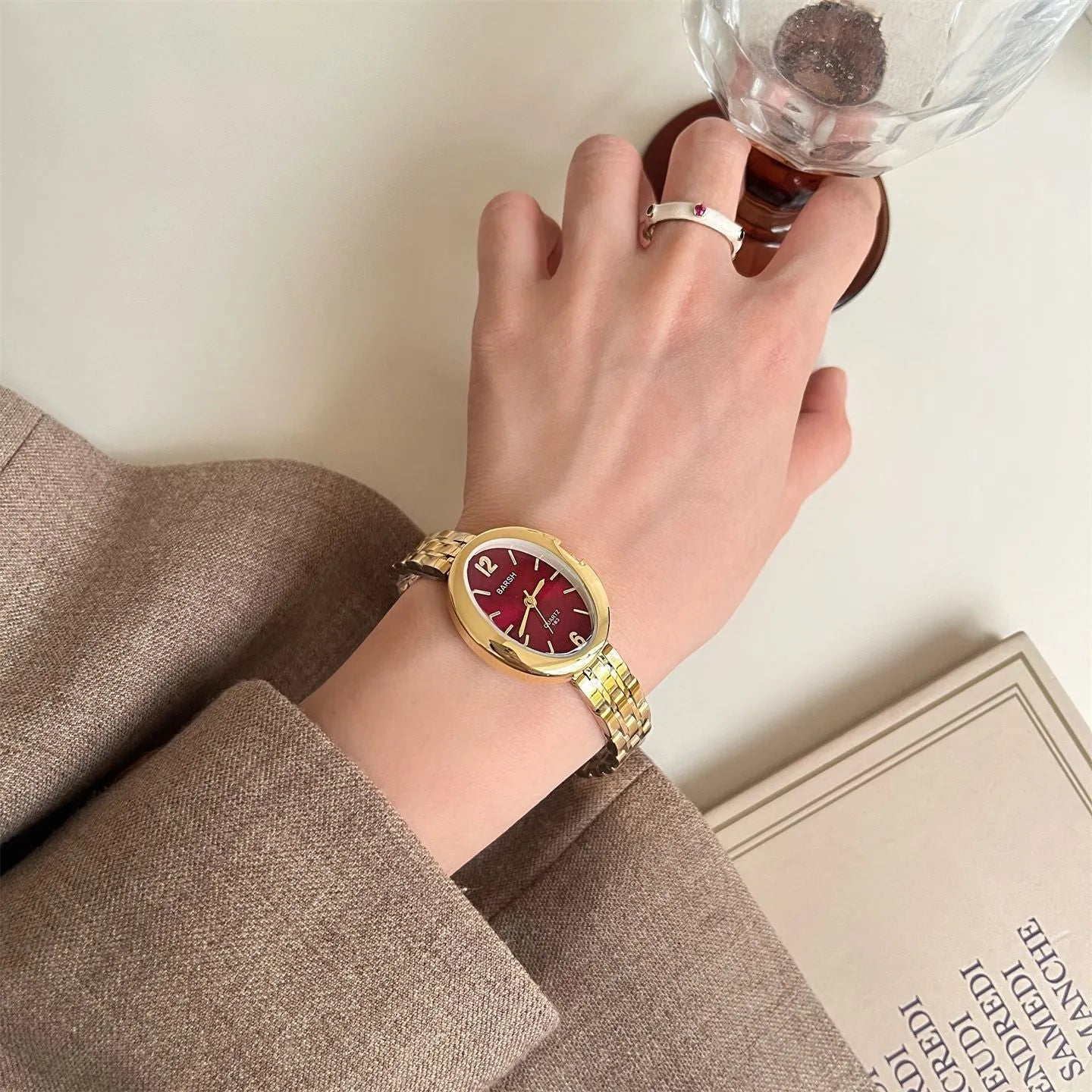 Oval alloy ladies watch with gold strap and choice of white gold or red dial face stainless steel back