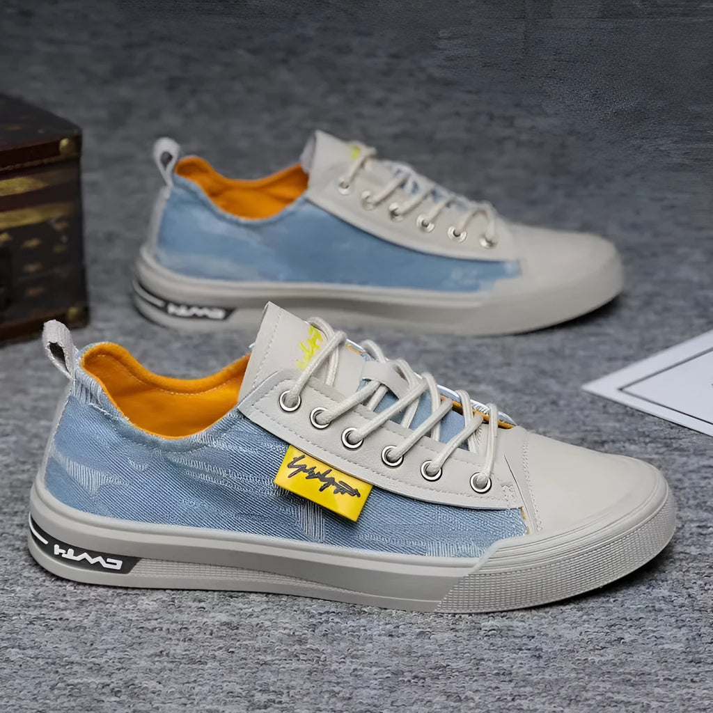 Men's dark blue casual canvas shoes with round toe and white rubber sole.