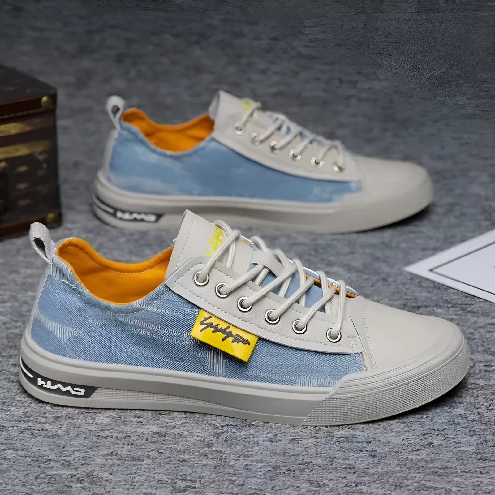 Men's dark blue casual canvas shoes with round toe and white rubber sole.