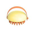 Silicone pet bathing brush with soft bristles and ergonomic handle in blue, pink, white, or yellow colours