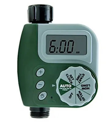 Green digital programmable hose timer with metal faucet connector and dual outlet ports for garden watering