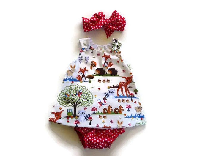 Red cartoon print cotton three-piece children's suit with dress, shorts and headband for baby girls