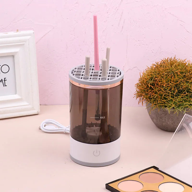 Grey and white electric makeup brush cleaning device with USB charging port