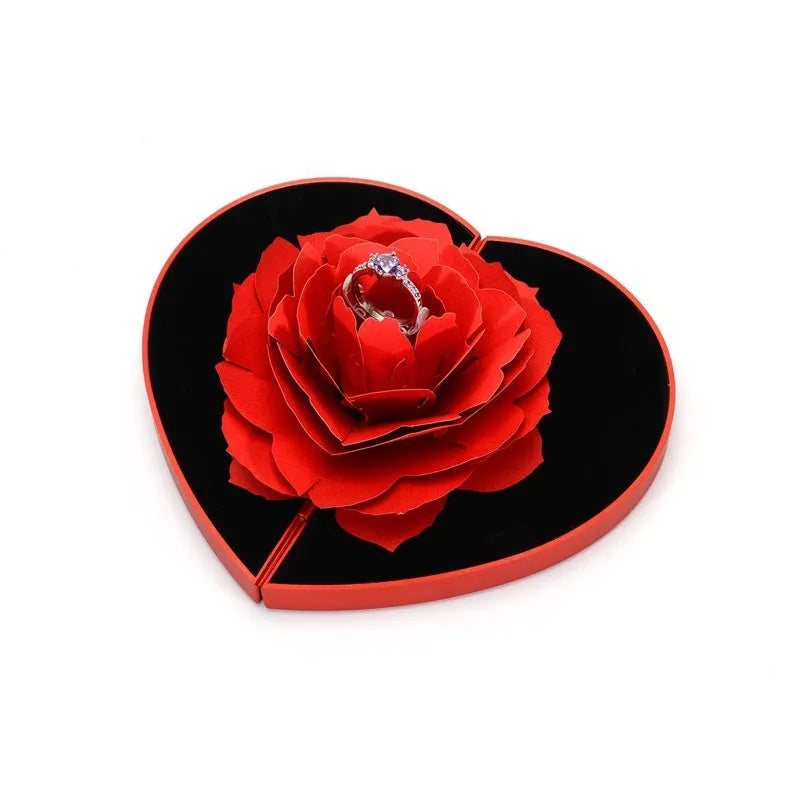 Red heart-shaped rotating ring box with 3D love design and rose flower pattern for jewellery storage