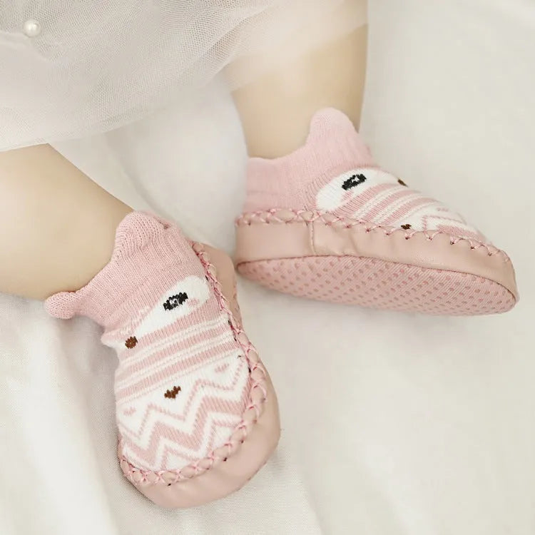 Baby floor socks with anti-slip sole in combed cotton fabric, showing colour and pattern options