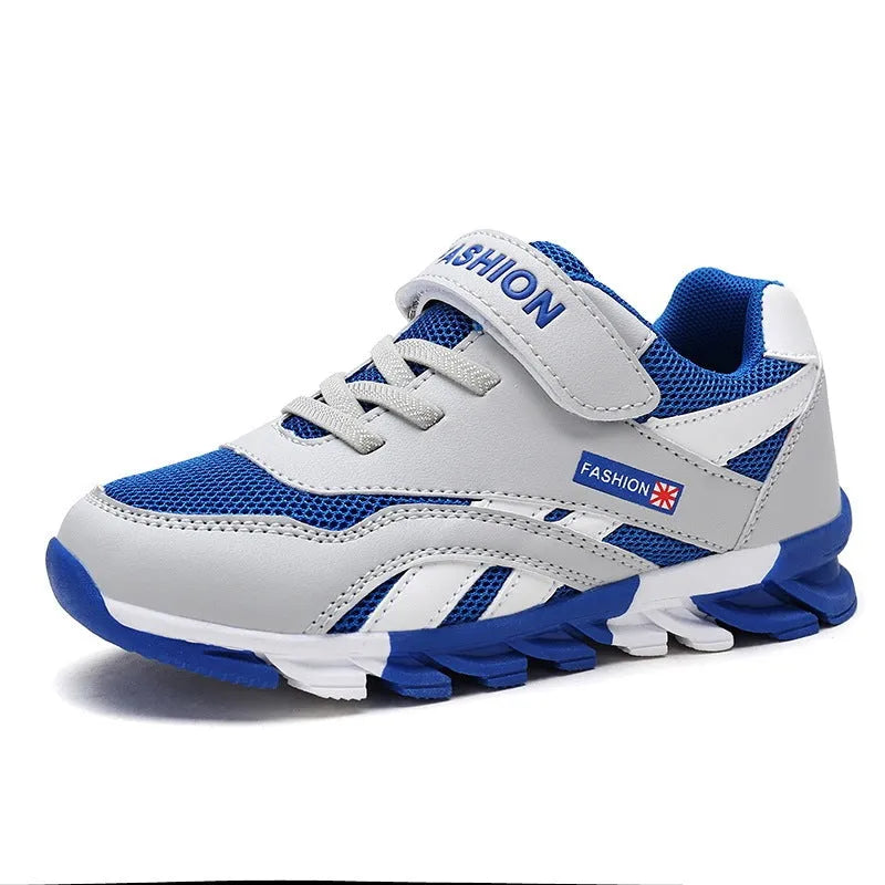 Children's grey Velcro running shoes with synthetic leather upper and rubber sole.