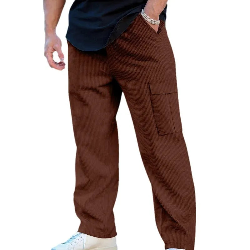 Men's straight-leg corduroy trousers in navy blue with an elasticated drawstring waist.