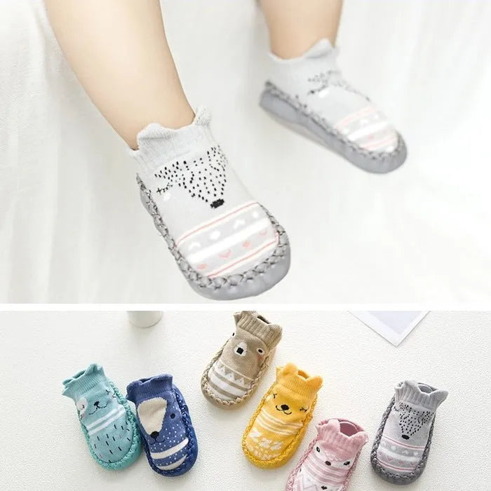 Baby floor socks with anti-slip sole in combed cotton fabric, showing colour and pattern options