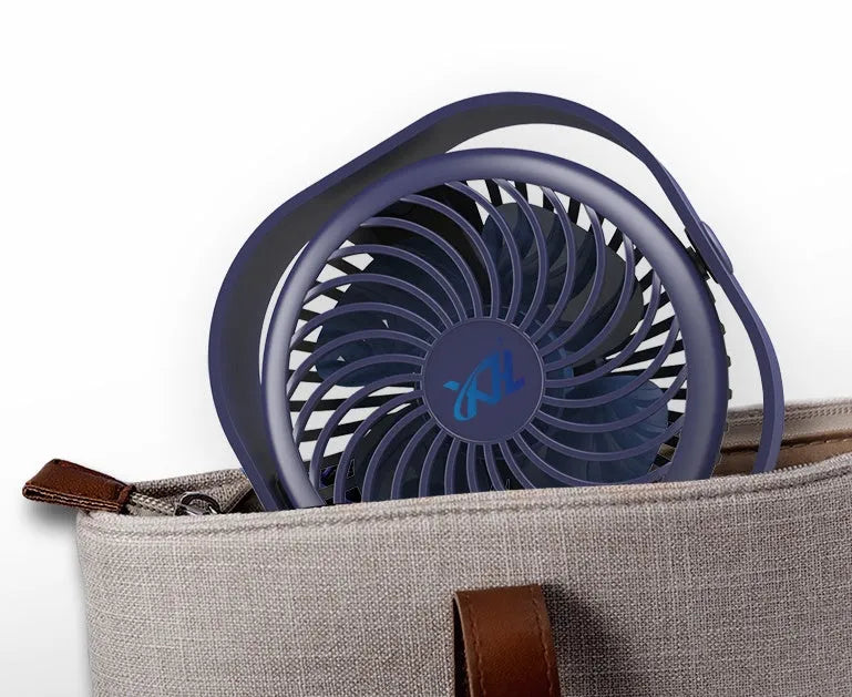 USB desk fan with 360-degree rotation in alarm clock style on a desk