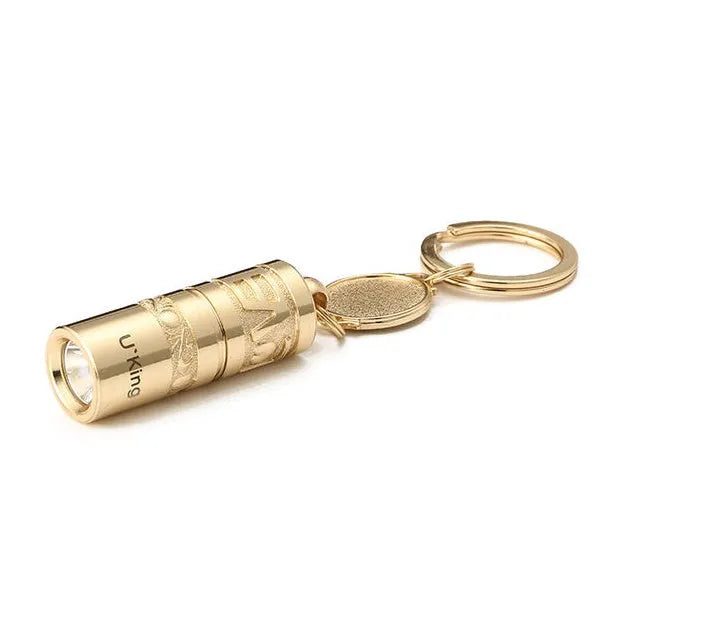 Gold zinc alloy waterproof LED flashlight attached to a keyring.