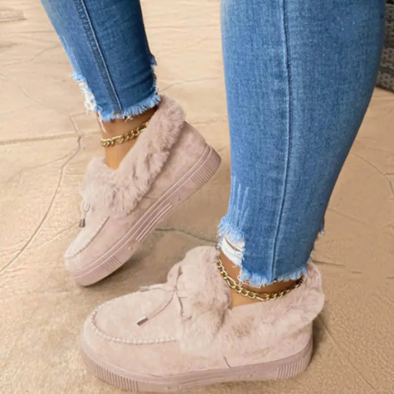 Women's white cotton casual shoes with velvet detail and a brown non-slip rubber sole.